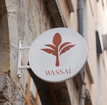 Enseigne avec le logo du café Wassaï à Lyon